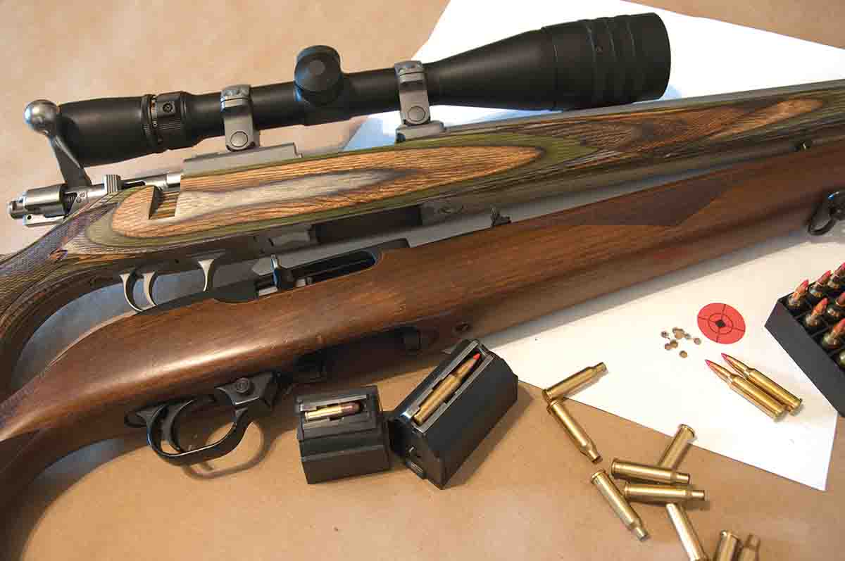 This Ruger 77/17 .17 Hornet with a Weaver 6-24x 42mm AO scope shoots 10-shot, sub-inch groups at 100 yards with Hornady 20-grain V-MAX Superformance Varmint factory loads. It is shown here with a nearly 40-year-old Ruger 10/22.